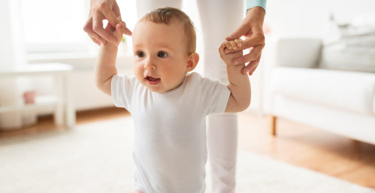 TEACHING A CHILD TO WALK